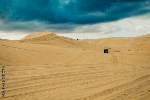 Jeep trail on the white sand dunes Mui Ne Vietnam  Southeast Asia. Before raining