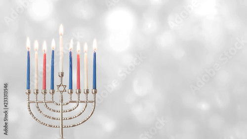 Hanukkah Jewish holiday background with menorah (Judaism candelabra) for Festival of Lights and Feast of Dedication with burning candles and traditional on white silver winter snow seasonal bokeh