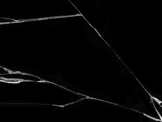 Cracked glass texture on black background. Isolated realistic cracked glass effect.