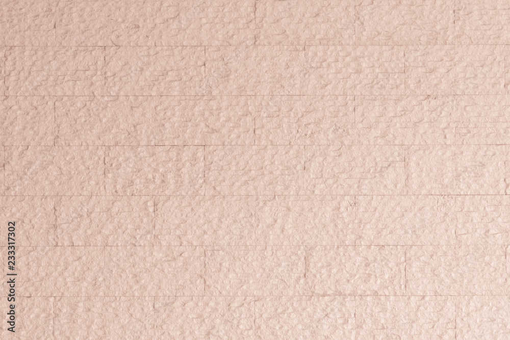 Limestone marble rock tile wall texture pattern background in light pastel red brown color