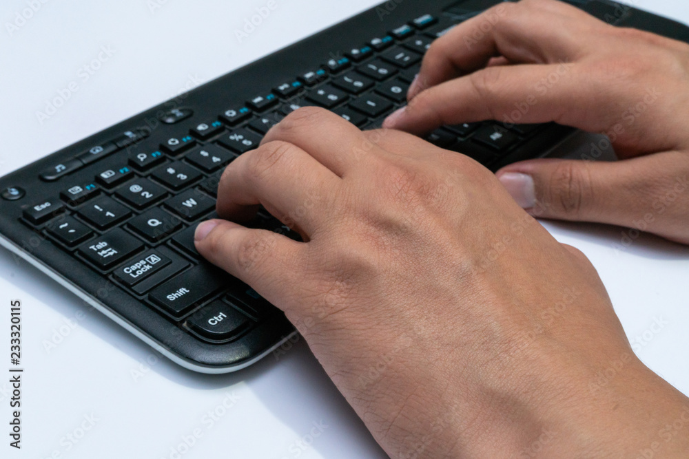 Working at home with laptop men writing a blog. Typing on a keyboard. Programmer or computer hacker Working at home with laptop men writing a blog. Typing on a keyboard. Programmer or computer hacker