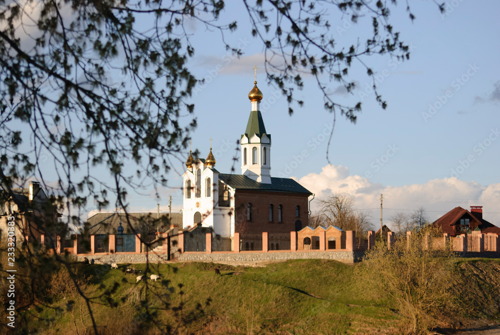 Orthodox Church on the autumn lake