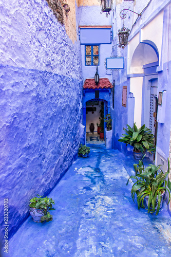 Picturesque lane in the blue medina of Chefchaouen, Morocco © zenobillis