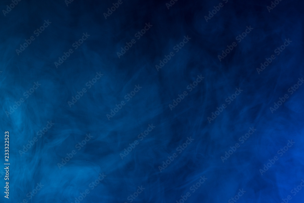 Obraz premium Colorful smoke close-up on a black background