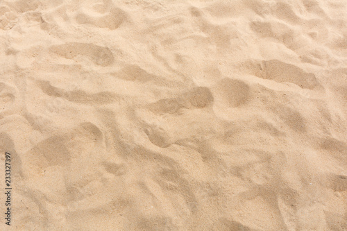 Sand background and texture in summer sun as background
