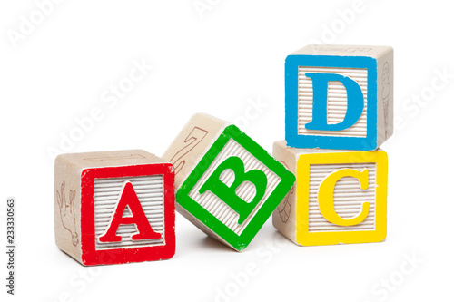 Wooden alphabet blocks isolated on white background