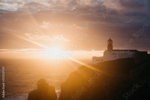 View of the lighthouse and cliffs at Cape St. Vincent in Portugal at sunset. The most south-western point of Europe.