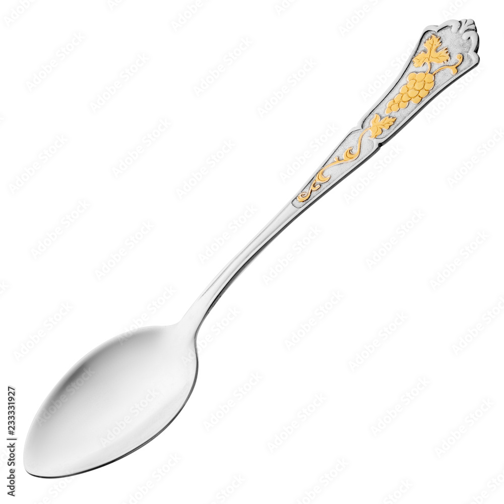Silver spoon small for baptism with a relief gold pattern on the handle Silver spoon small for baptism with a relief gold pattern on the handle