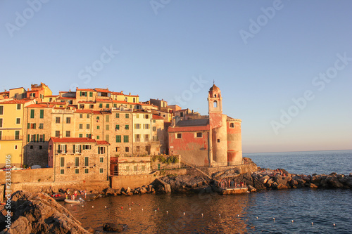 City and castle by the sea. The houses of the old town and the castle are located on a narrow cape jutting out into the sea.