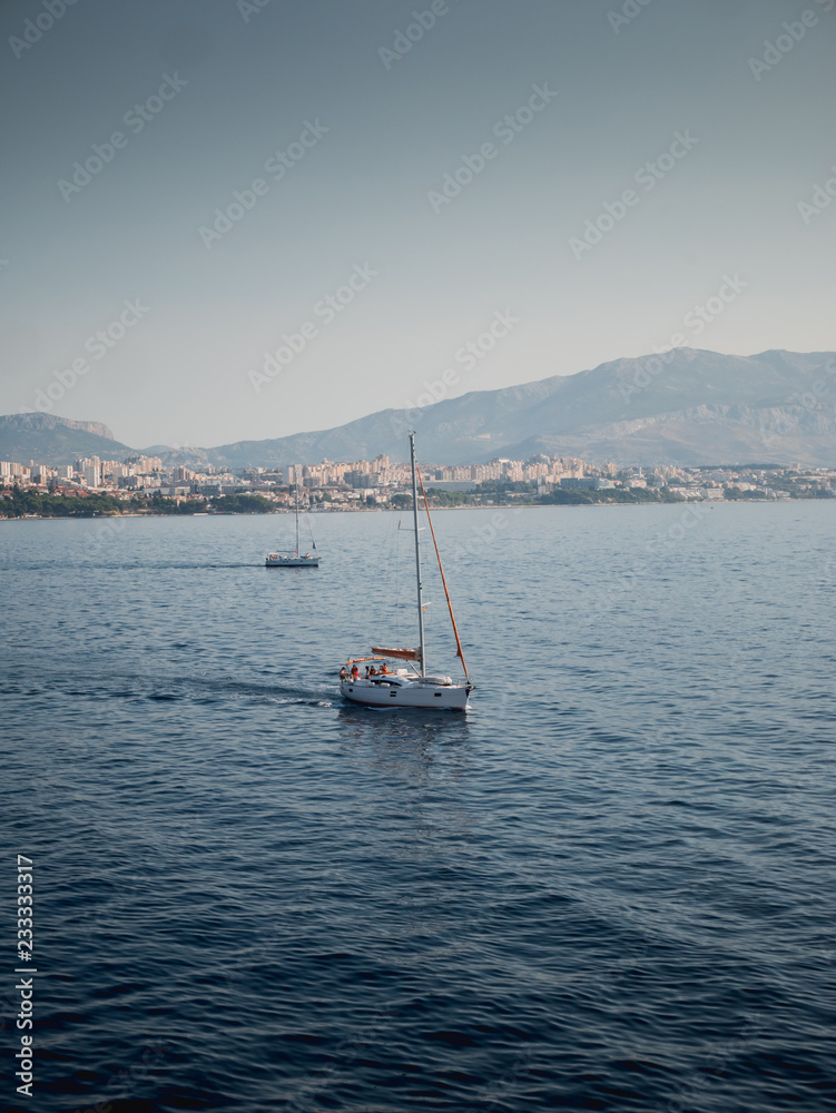 Sailboats in front of city Split in Croatia