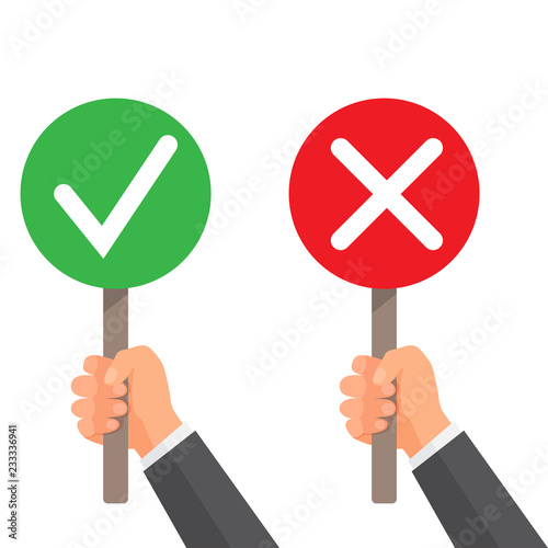 Man hand hold signboard green check mark and red X