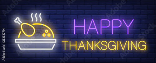 Happy thanksgiving neon text with roasted turkey. Thanksgiving Day advertisement design. Night bright neon sign, colorful billboard, light banner. Vector illustration in neon style.