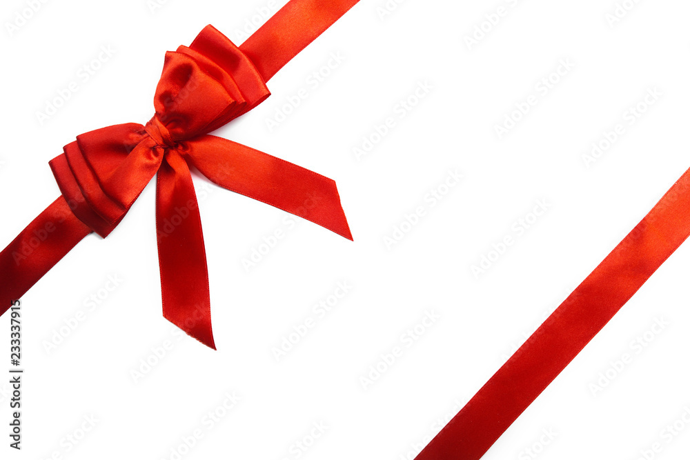 Shiny red satin ribbon on white background Shiny red satin ribbon on white background