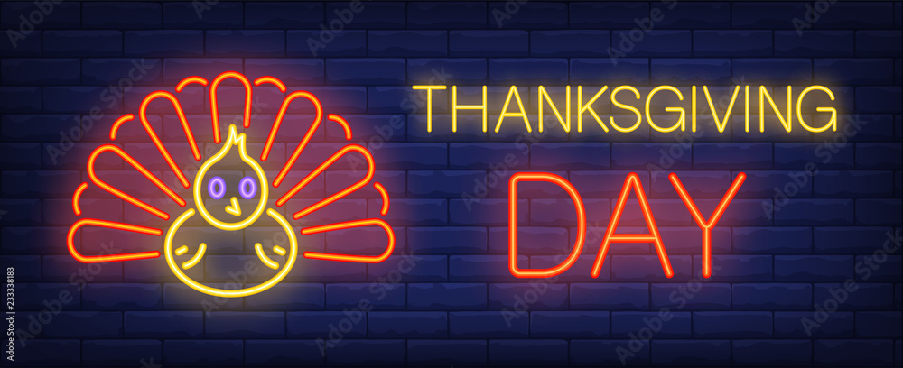 Thanksgiving day neon text with turkey. Thanksgiving Day advertisement