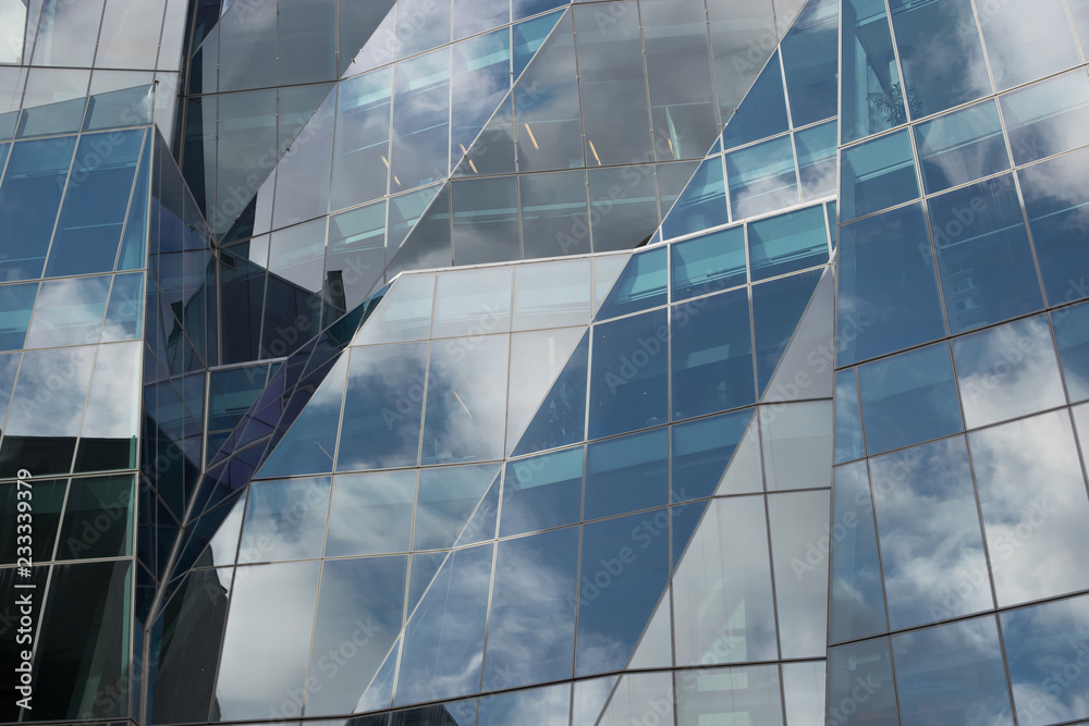 Fototapeta premium Windows reflecting clouds