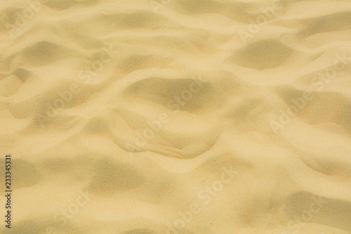 Texture of beach sand as background. © BUDDEE