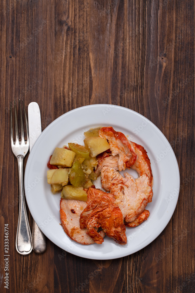 grilled turkey with vegetables on white plate grilled turkey with vegetables on white plate