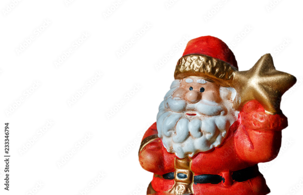 Obraz premium Santa Claus figure holds a star as a symbol of Christmas and new year on the white background.