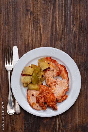 grilled turkey with vegetables on white plate