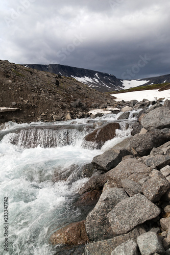 mountain stream in the Khibiny mountains in the north of Russia