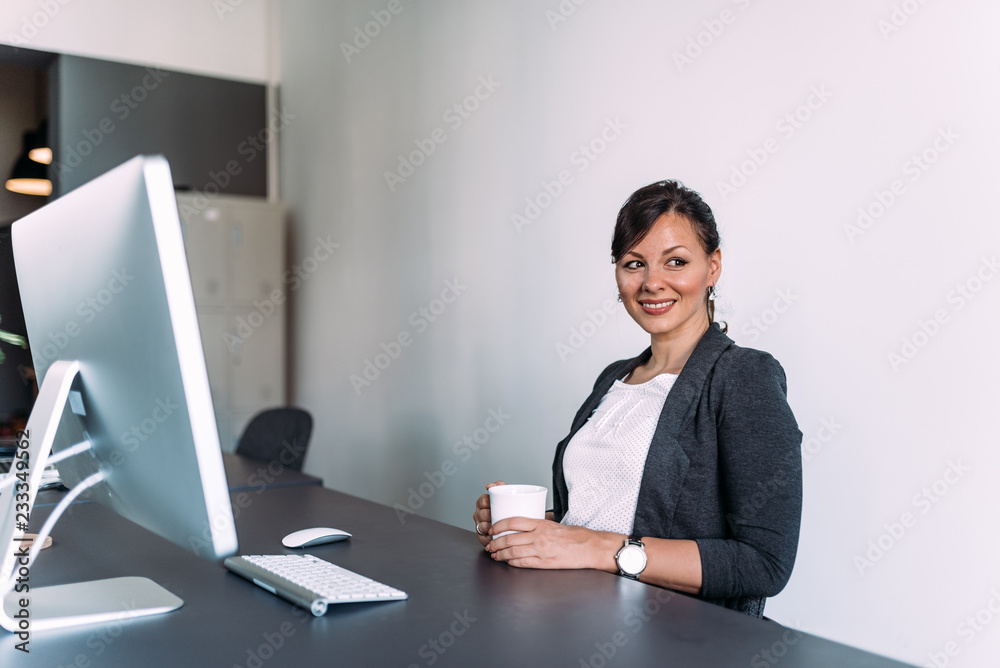 Gorgeus woman in modern office. Copy space. Gorgeus woman in modern office. Copy space.