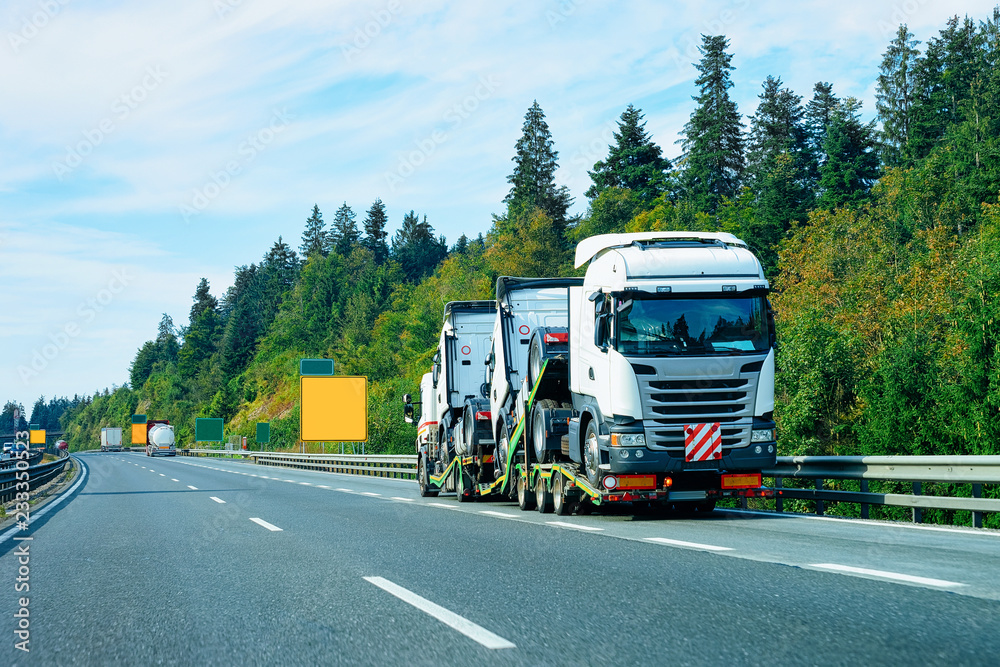 Truck cabin carrier on asphalt road in Slovenia