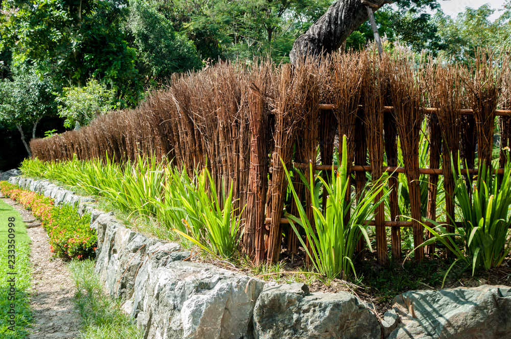 Obraz premium Fence decorated with trees, Japanese fences house