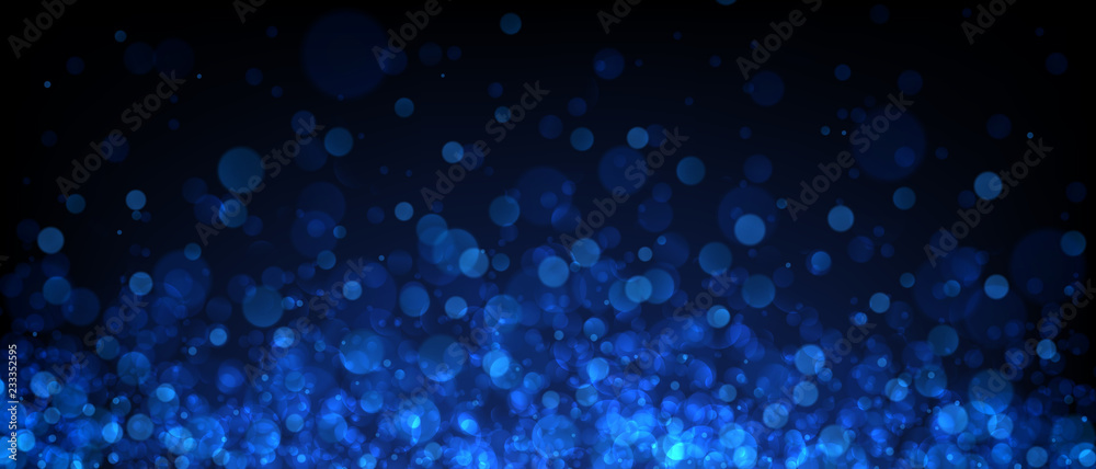 Blue abstract blurred background with bokeh effect.
