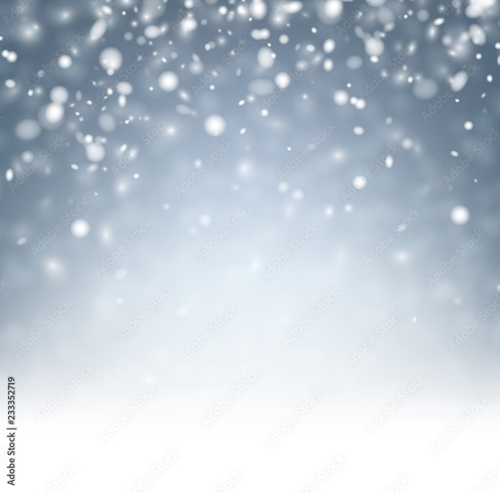 Grey blurred abstract winter background with snow.