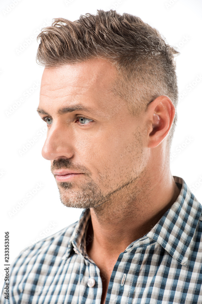 Obraz premium close up portrait of pensive adult man looking away isolated on white