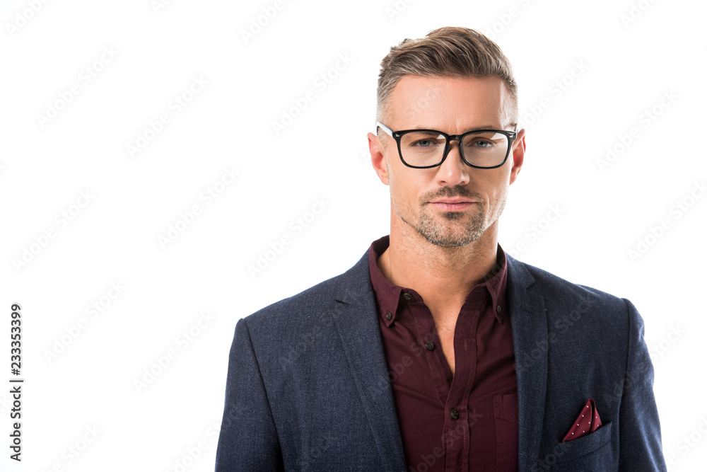 portrait of stylish man in eyeglasses and jacket looking at camera isolated on white portrait of stylish man in eyeglasses and jacket looking at camera isolated on white