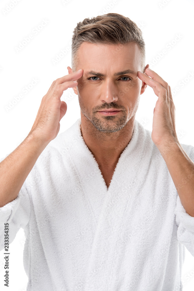 upset man in bathrobe worrying about own appearance isolated on white upset man in bathrobe worrying about own appearance isolated on white