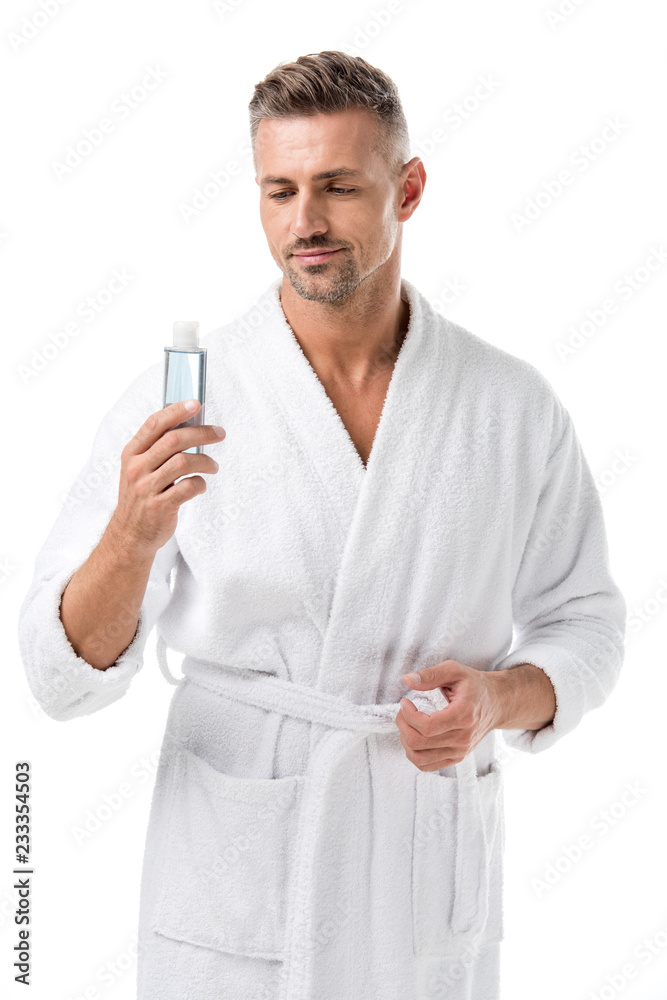 man in bathrobe holding shaving lotion isolated on white man in bathrobe holding shaving lotion isolated on white