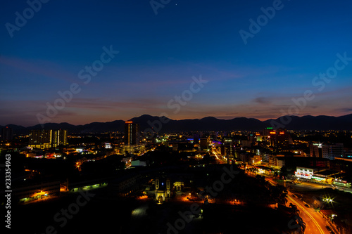 Aerial View of Ipoh CIty Malaysia during sunset. soft focus blur due to long exposure. visible noise due to high ISO.