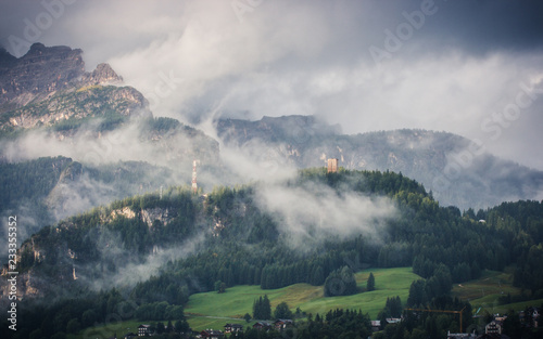 Pocol in a foggy and rainy day in Cortina d'Ampezzo, Dolomites, Italy.