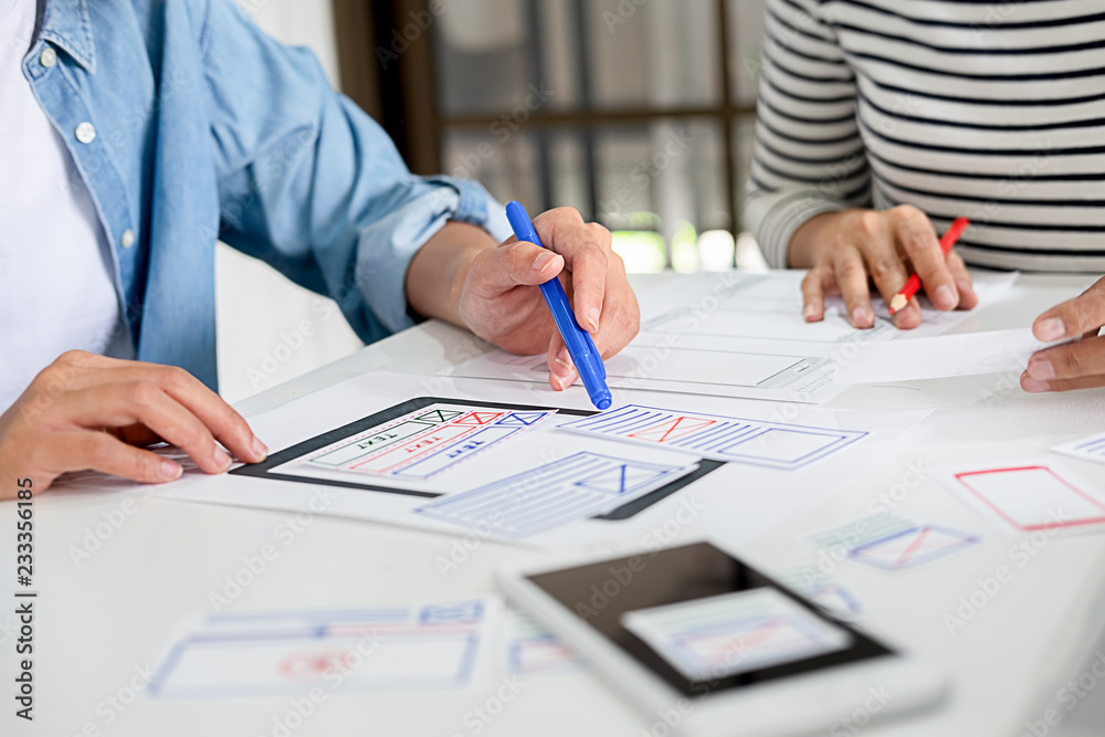 Creative Web Designer planning application and developing template layout, framework for mobile phone. User experience (UX) concept. Creative Web Designer planning application and developing template layout, framework for mobile phone. User experience (UX) concept.