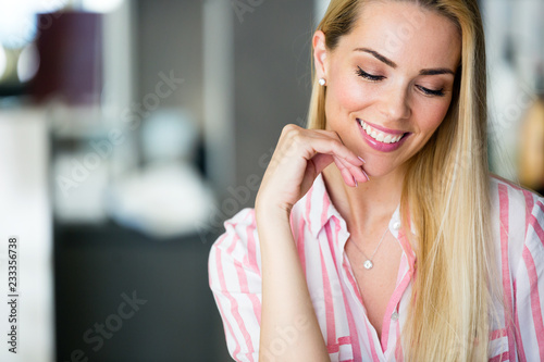 Free Download Portrait of beautiful young happy smiling woman with long hair - GFXLoad