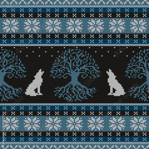 Winter night, Tree of life and howling wolves. Knitted woolen seamless pattern