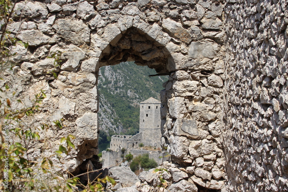 Pocitelj is a village in the Čapljina municipality in Bosnia and Herzegovina. The village is built in a natural karst amphiteatre along the Neretva river. Pocitelj is a village in the Čapljina municipality in Bosnia and Herzegovina. The village is built in a natural karst amphiteatre along the Neretva river.