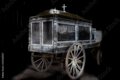 Fényképezés Old and dusty wooden hearse carriage from the 19th century