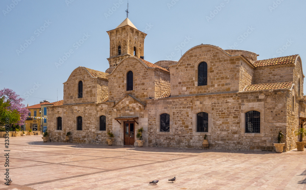LARNACA, CYPRUS - april 18, 2017 : Pigeons outside of the 9th century Greek Orthodox Church of Ayios Lazarus in Larnaca, southern Cyprus. Known as Church of Saint Lazarus.