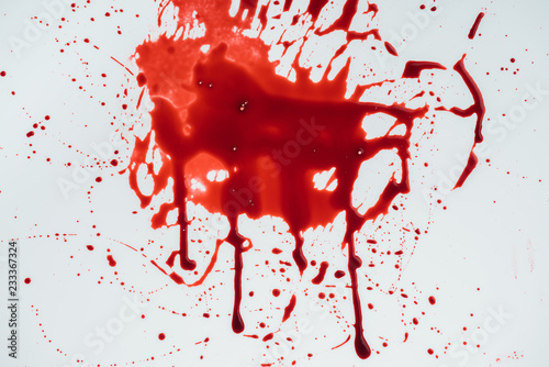 top view of blood blot on white surface