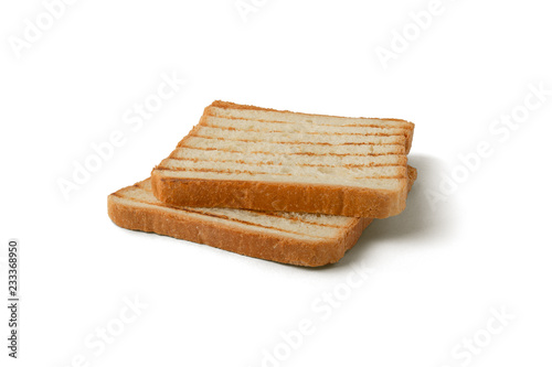 Slices of toast bread grilled with a golden crust