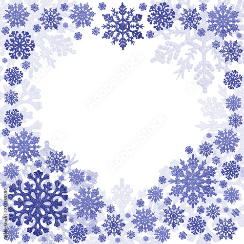 Fototapeta Naklejka Na Ścianę i Meble -  blue heart shape snowflakes frame on white