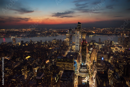 View of the night city and glowing skyscrapers from a height at sunset  New York. USA   © Ann Stryzhekin