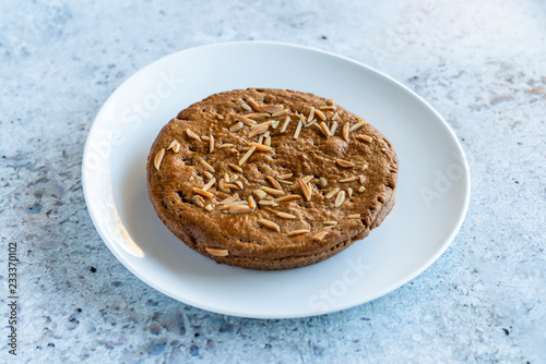 Dutch speculaas pie on white plate photo