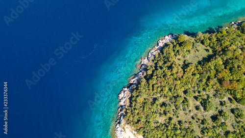 Fototapeta Naklejka Na Ścianę i Meble -  Aerial view of crystal clear water off the coastline in Croatia