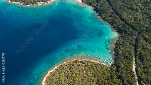 Fototapeta Naklejka Na Ścianę i Meble -  Aerial view of crystal clear water off the coastline in Croatia