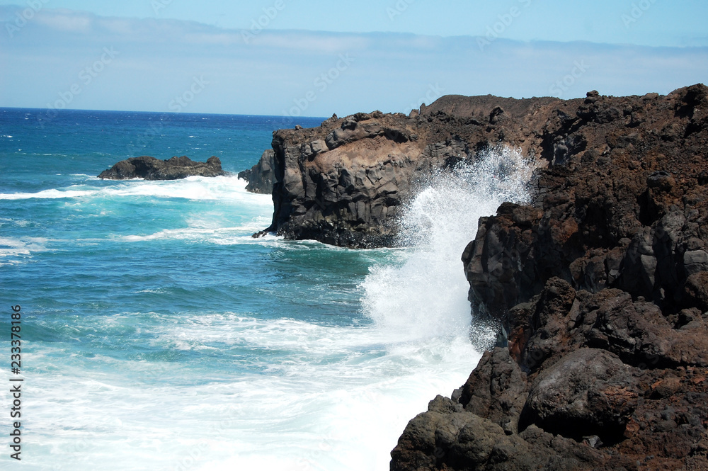 Wave on rocks