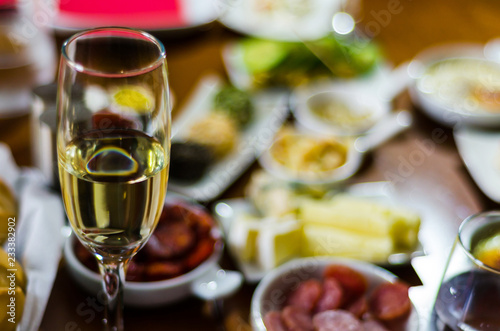 champagne with set appetizers in small portions, healthy and delicious snacks